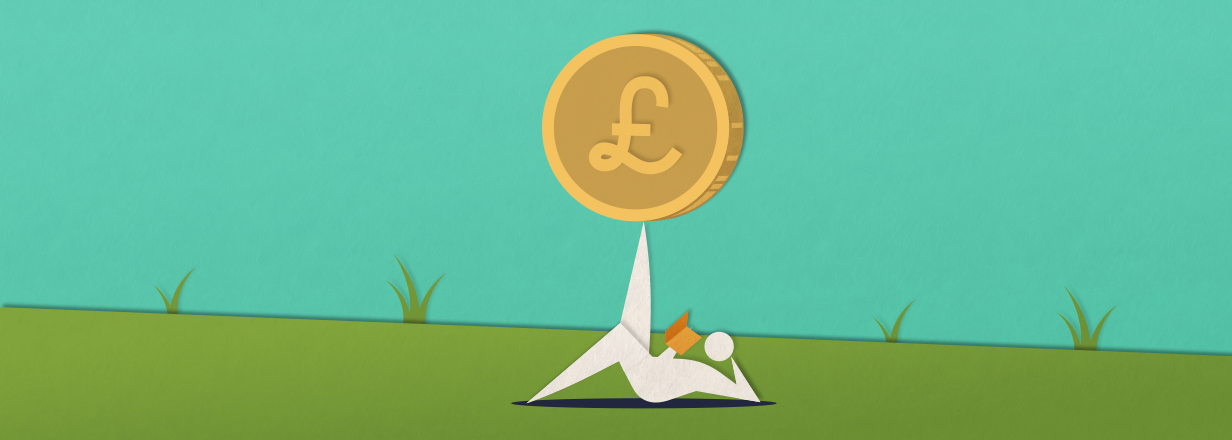 Image shows a stick figure laying on grass reading a book with one hand and the other elbow against the floor keeping their head up. They have one leg up and is balancing a coin with their foot.